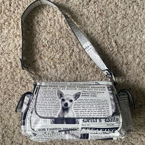 Dolls kill breaking news gen kiss chihuahua bag